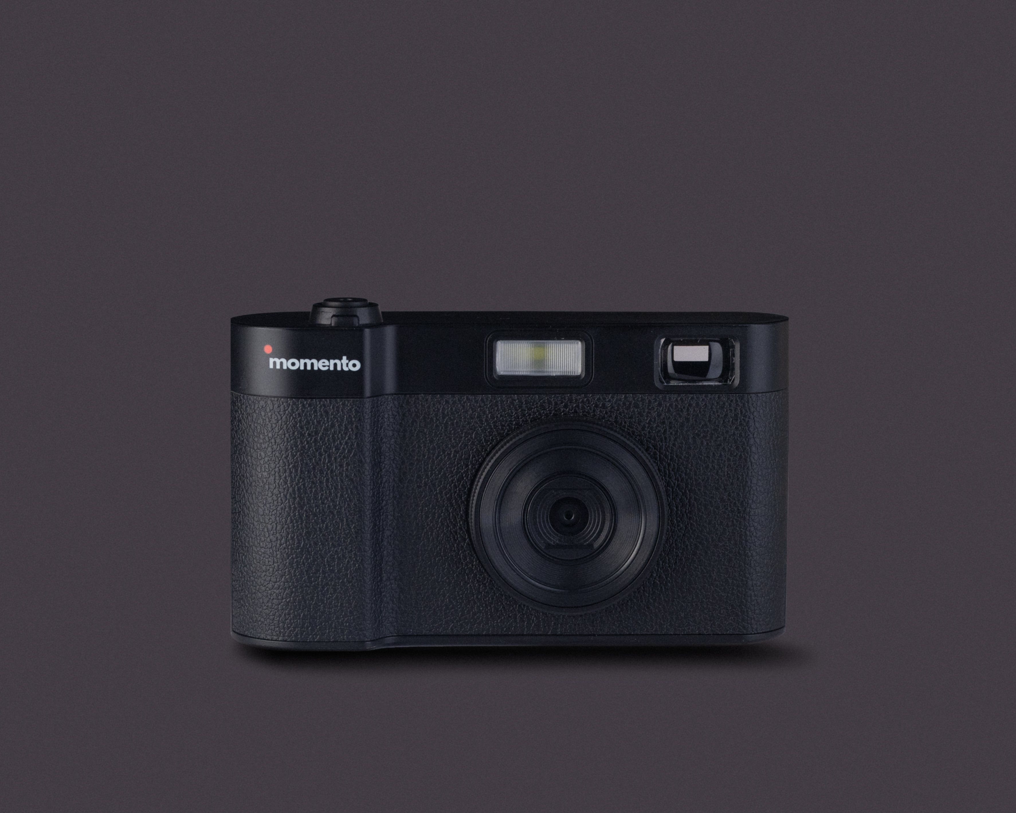 Black on black MOMENTO camera in a front studio view