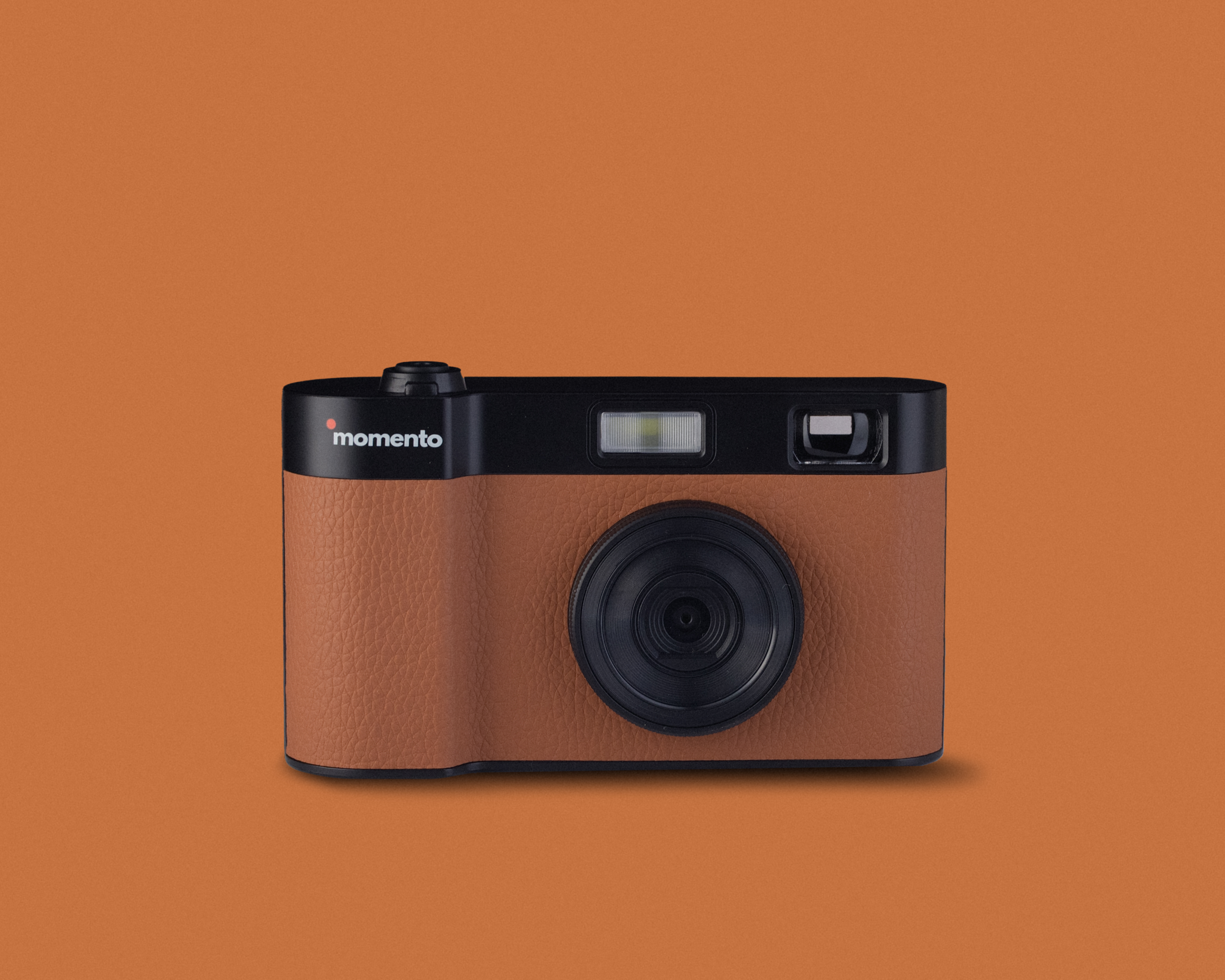 Brown MOMENTO camera in a front studio view